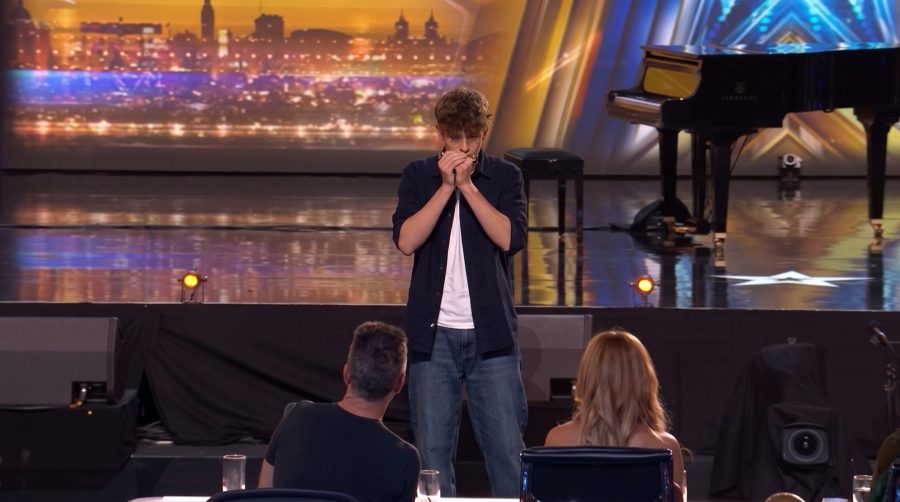 Rafferty Coope celebrates after KSI presses the Golden Buzzer during his Britain’s Got Talent 2026 audition.